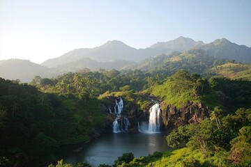 Waterfall plunges into pool below; mountains with lush green trees behind during sunrise
