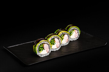 Fresh Sushi avocado shrimp Rolls Presenting Exquisitely on a Black Background