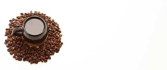 Background with a cup of hot fresh black coffee and freshly roasted coffee beans. Banner with space for text on the right