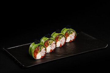 Fresh Sushi avocado shrimp Rolls Presenting Exquisitely on a Black Background