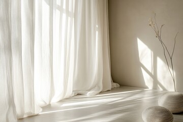 Sunlight streams through sheer curtains in a minimalist interior