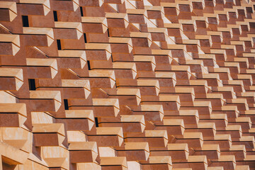 Modern building decoration with stone materials close-up. Architecture details and fragment, architecture fragment, urban city view, urban construction, architecture detail close up