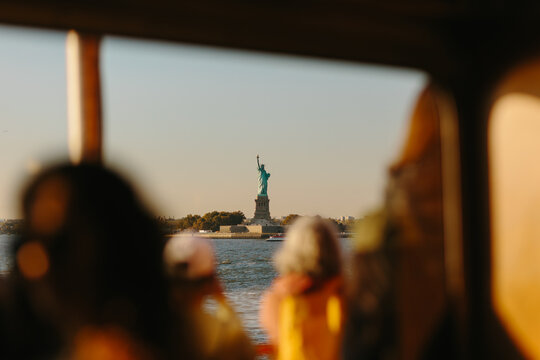 Viewing the Statue of Liberty from a Boat Window in New York