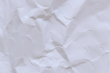 Crumpled white paper background. Crumpled white paper texture or paper background. Light background with copy space. Top view