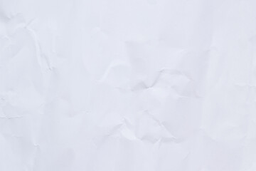 Crumpled white paper background. Crumpled white paper texture or paper background. Light background with copy space. Top view