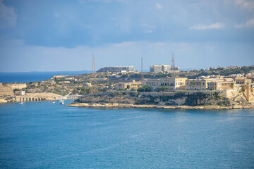Naklejka premium Amazing city walls of Valletta, capital of Malta. The Capital Of Malta Is Valletta. Sea gate of the city.