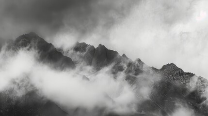 Mountains Veiled in Clouds with Gentle Natural Light