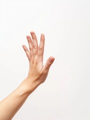 Close-up shot of hand with palm up on white background, ready to give or receive