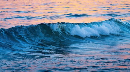 Vibrant sunset illuminating cresting ocean waves on the horizon