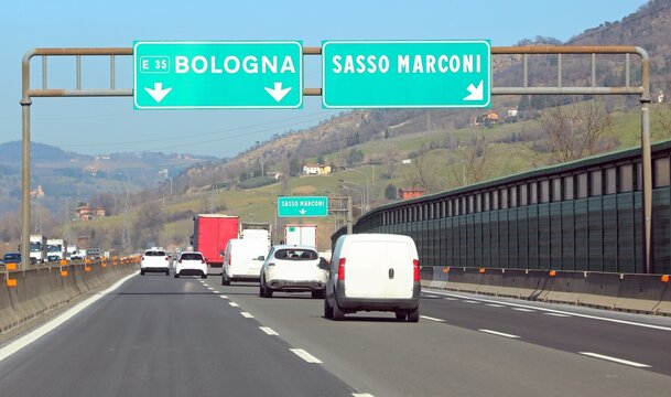 Traffic on the Italian highway called A1 and the junction for Bologna or for city of Sasso Marconi