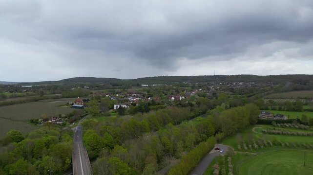 High Angle British Agricultural Farms at Gorgeous Countryside Landscape of England Great Britain of United Kingdom. Footage Was Captured with Drone's Camera from Medium High Altitude