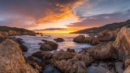 Vibrant Sunset Over Rocky Coastline