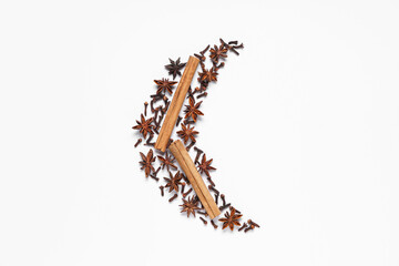Crescent made of aromatic spices on white background. Ramadan celebration