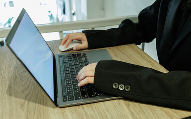 A female investor analyzes past trends, sets goals, diversifies assets, and manages risks to ensure...