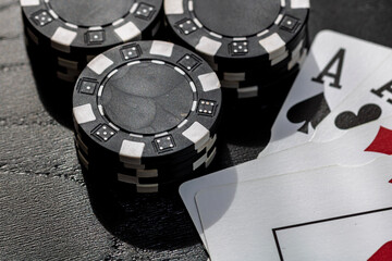 Naklejka premium Casino chips and cards on the table. Gambling concept