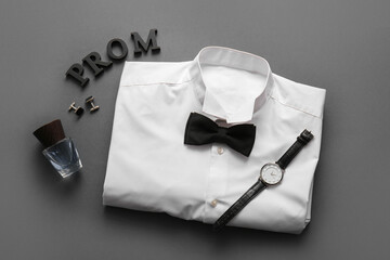 Word PROM, shirt and male accessories on grey background
