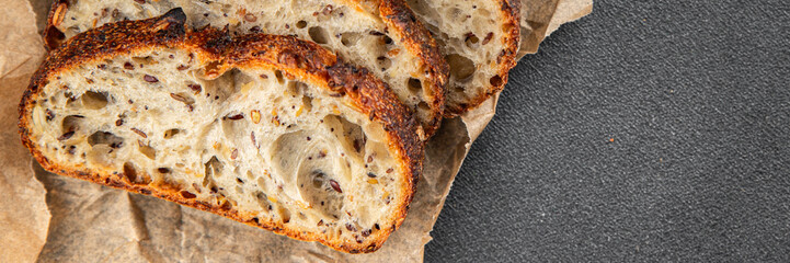Grain bread sunflower, chia, flax seed, cut oats fresh tasty food dish delicious gourmet food background on the table rustic food top view copy space vegetarian and vegan food