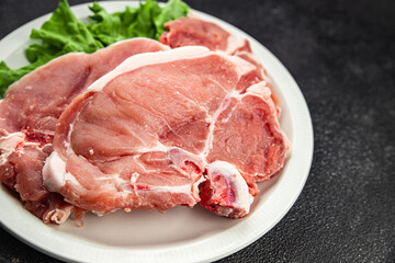 Pork on bones raw meat fresh tasty food dish delicious gourmet food background on the table rustic food top view copy space