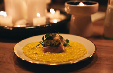 fresh risotto with baked salmon