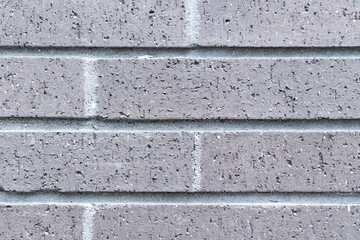 Brick masonry background. Building material concept. Surface of brickwall. Textured brown backdrop. Wall texture background. Brick wall structure