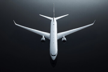 Commercial airplane on a dark background.