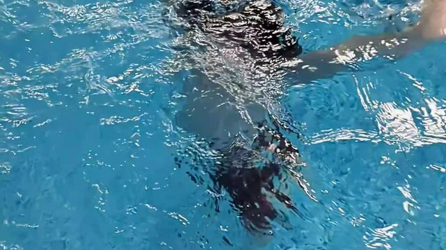 Energizing aquatic workout in a vibrant pool setting during a sunny afternoon