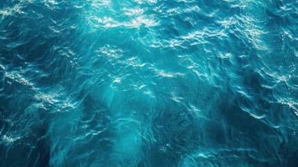 Fototapeta premium Aerial perspective of turquoise ocean waves, blue sea surface, transparent water background, serene and clear