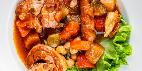 Meat ragout sausages, vegetable stew dish fresh tasty food gourmet food background on the table rustic food top view copy space