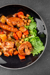 Meat ragout sausages, vegetable stew dish fresh tasty food gourmet food background on the table rustic food top view copy space