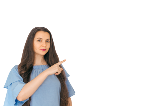 A young, attractive girl points to the side to present a product. A sign, an empty space for advertising, inscription, design. White background. - Powered by Adobe