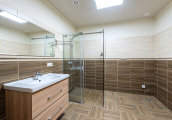 Modern Bathroom Interior with Wooden Panels and Glass Shower Enclosure for Elegance