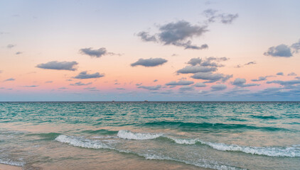 Romantic summer vacation sunrise on seascape. Sea horizon view. Cloudy sky and seascape at summer...