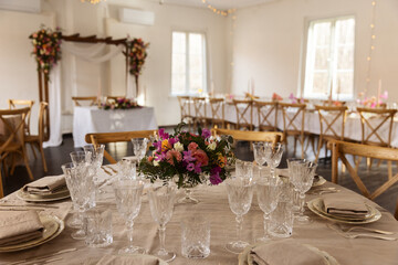 Wedding table setting with flowers.