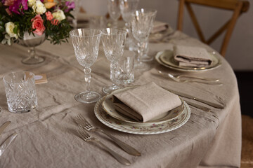 Wedding table setting with flowers.