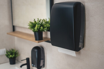 Black dispenser for hand towels.Matte shade.