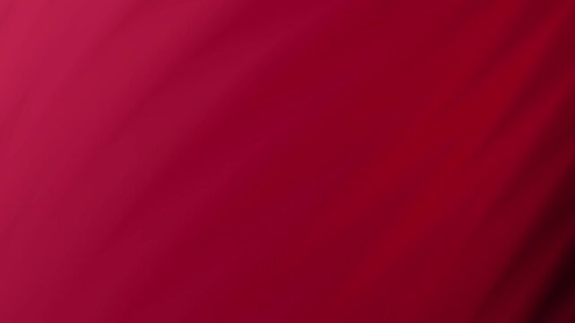 Blurred red background perfect for festive designs, Valentines Day graphics, energetic concepts, and abstract backgrounds with a vibrant touch.
