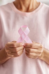 Symbol of hope and support held gently, showcasing awareness for