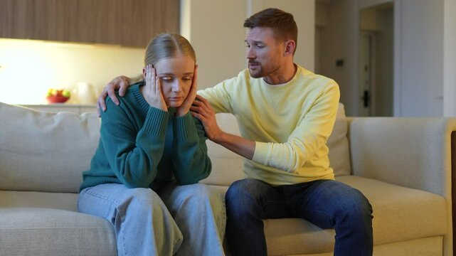 Devastated grieving wife sobs uncontrollably as husband hold embrace comfort her, emotional support. Shared sorrow, overwhelm sadness, deep loss, heartbreaking couple in distress, love and care