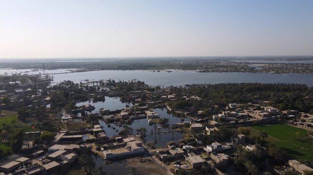 4K Aerial Drone Shot of a Remote Flooded Village in Sindh, Pakistan &ndash; Wide Pan-Out View