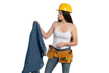 Female construction worker inspecting her denim shirt