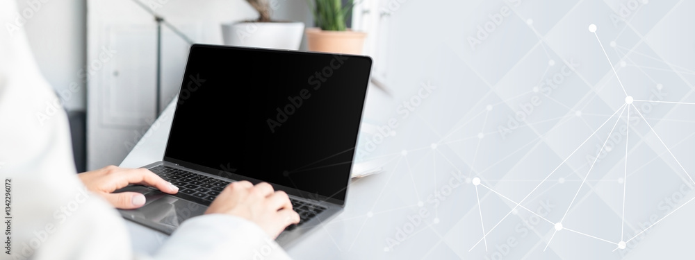 Aufkleber unrecognizable businesswoman using laptop computer with white blank screen, typing on keyboard, mock