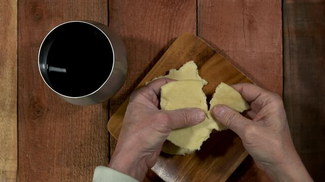 Jesus breaking bread at the first communion