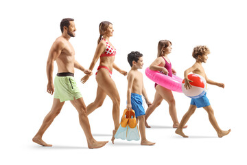 Obraz premium Family with kids wearing swimming suits and walking
