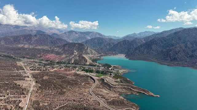 Aerial video of the Potrerillos Dam, Mendoza. The Andes Mountains are in the background.