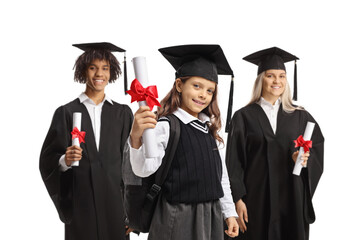 Little schoolgirl posing with college graduate students