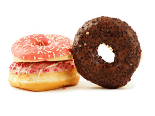 Three donuts stacked on top of each other with pink frosting and sprinkles. The donuts are piled high and look delicious. Internationally popular pastry product. Perfect desert.