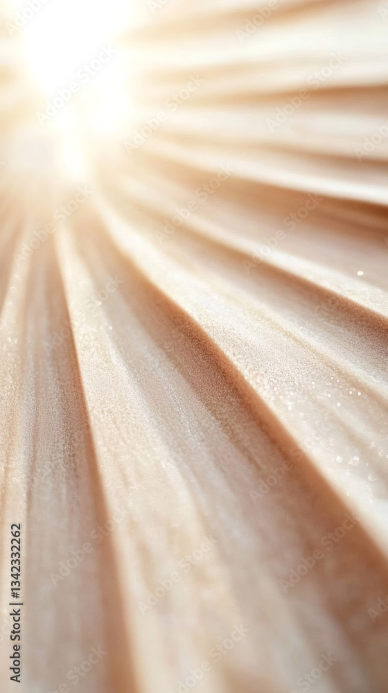 Poster Pleated beige fabric texture illuminated by a bright light beam creating a beautiful abstract background