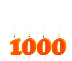 Orange candles forming the number 1000 - Number of views, views or followers.