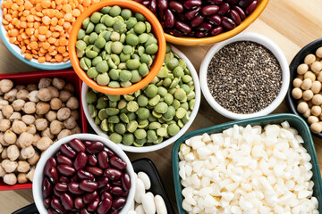 several pots with raw grains for preparing healthy food