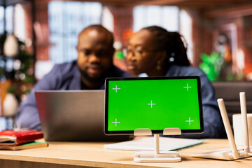 Black couple tries to fix an ongoing Wi Fi problem by rebooting their modem next to copy space...